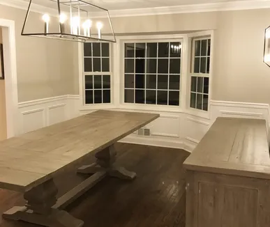 Dining room with fresh white wainscoting and trim, painted by Paint Plus in Chatham, NJ